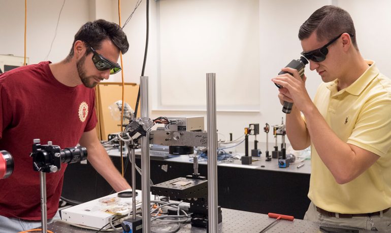Two student researchers at the National Institute of Aerospace